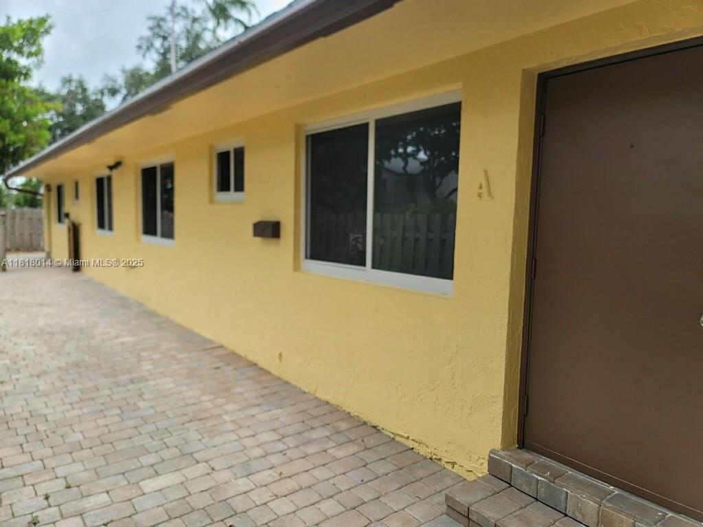 3490 Atlanta Street, Unit B Hollywood, FL 33021 - Photo 18 of 21 a view of house with yard