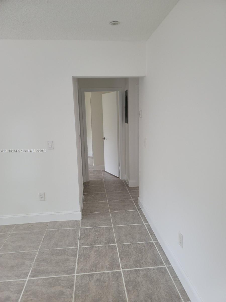 3490 Atlanta Street, Unit B Hollywood, FL 33021 - Photo 20 of 21 a view of an empty room