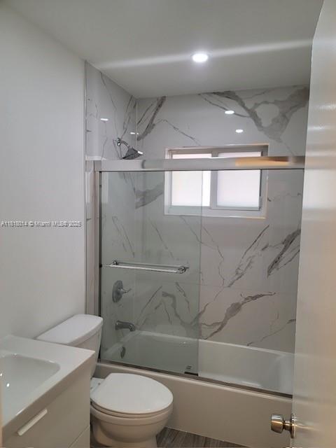 3490 Atlanta Street, Unit B Hollywood, FL 33021 - Photo 2 of 21 a bathroom with a toilet a sink and shower