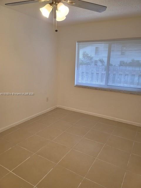 3490 Atlanta Street, Unit B Hollywood, FL 33021 - Photo 7 of 21 a view of a room with wooden floor and white walls