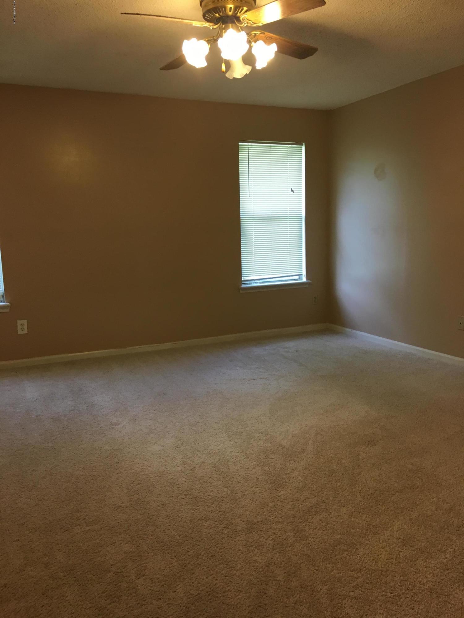 8435 Gemini Road Jacksonville, FL 32216 - Photo 11 of 24 Master Bedroom