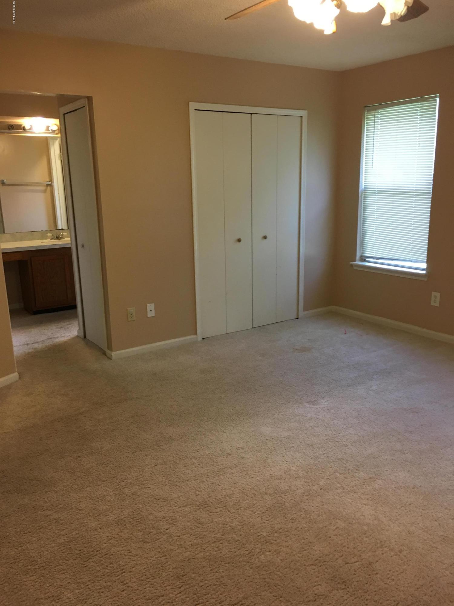 8435 Gemini Road Jacksonville, FL 32216 - Photo 12 of 24 Master Bedroom
