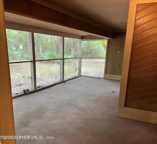 a view of a porch with a door