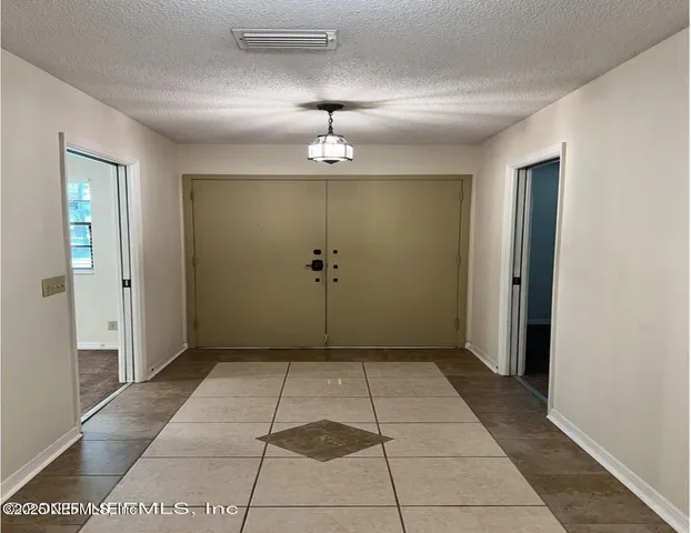 a view of livingroom with kitchen