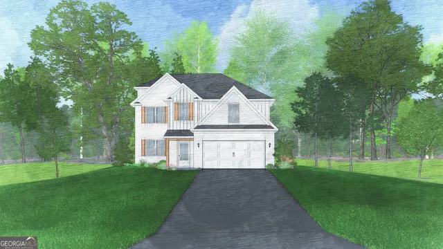 a front view of a house with a yard and trees