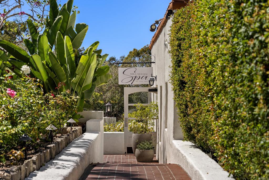 5929 Linea Del Cielo, Unit JACARANDA Rancho Santa Fe, CA 92067 - Photo 15 of 16 a view of small house with potted plants