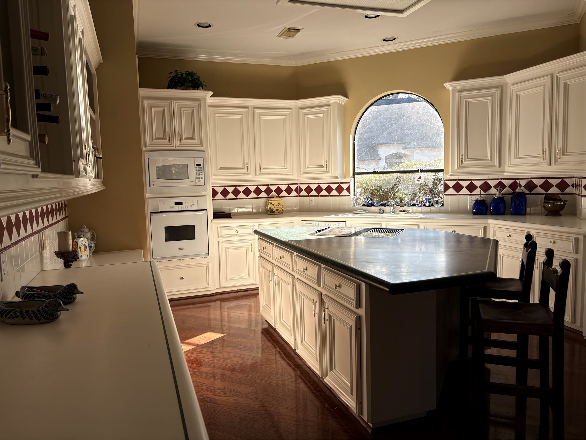 24602 West Kingscrest Circle Spring, TX 77389 - Photo 7 of 20 a kitchen with cabinets a sink and appliances