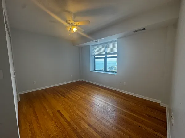 a view of an empty room and window