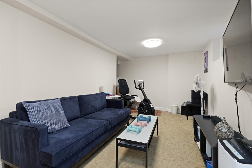 36 Gorham Street, Unit 3 Cambridge, MA 02138 - Photo 19 of 31 a living room with furniture and a couch