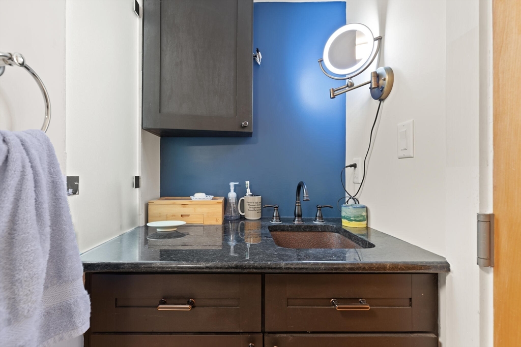 36 Gorham Street, Unit 3 Cambridge, MA 02138 - Photo 22 of 31 a close view of sink and tap