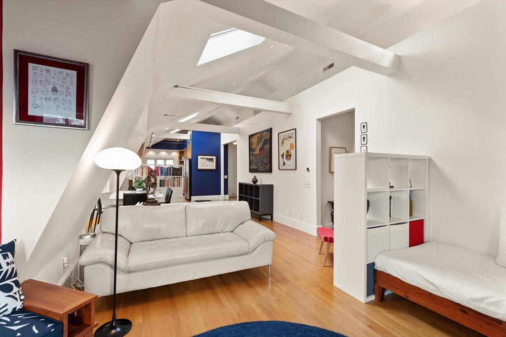 36 Gorham Street, Unit 3 Cambridge, MA 02138 - Photo 4 of 31 a living room with furniture and wooden floor