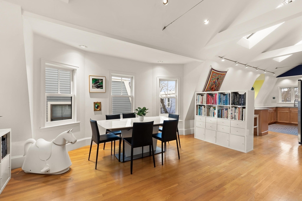 36 Gorham Street, Unit 3 Cambridge, MA 02138 - Photo 6 of 31 a living room with furniture and a wooden floor