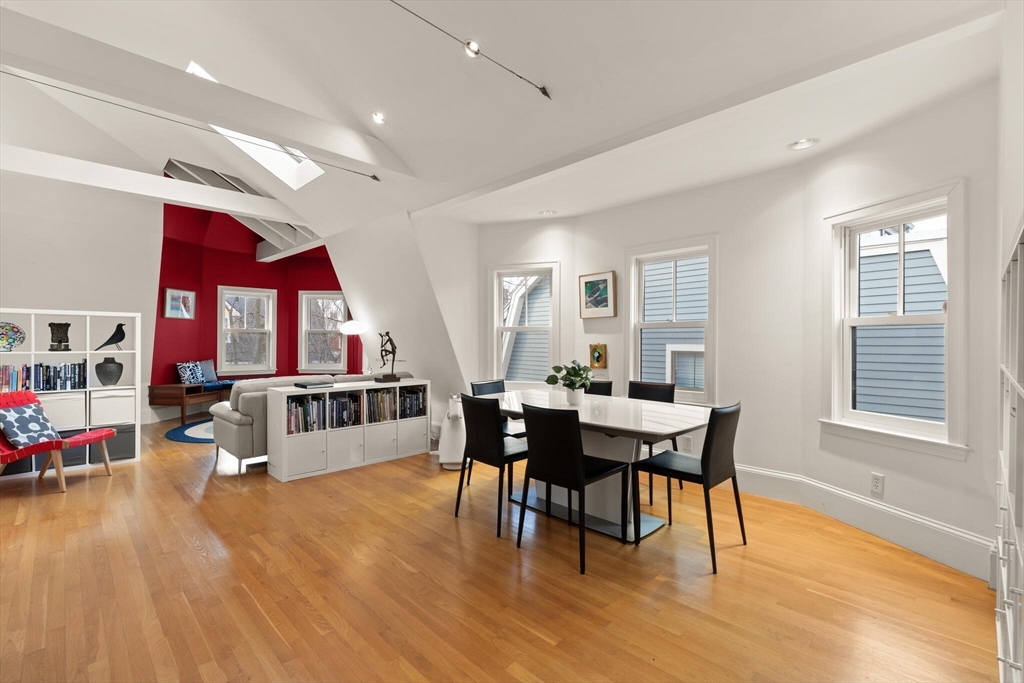 36 Gorham Street, Unit 3 Cambridge, MA 02138 - Photo 7 of 31 a view of a dining room with furniture and wooden floor