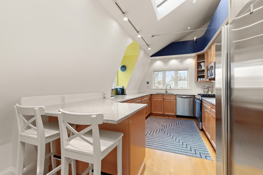 36 Gorham Street, Unit 3 Cambridge, MA 02138 - Photo 9 of 31 a kitchen with a sink cabinets and counter space