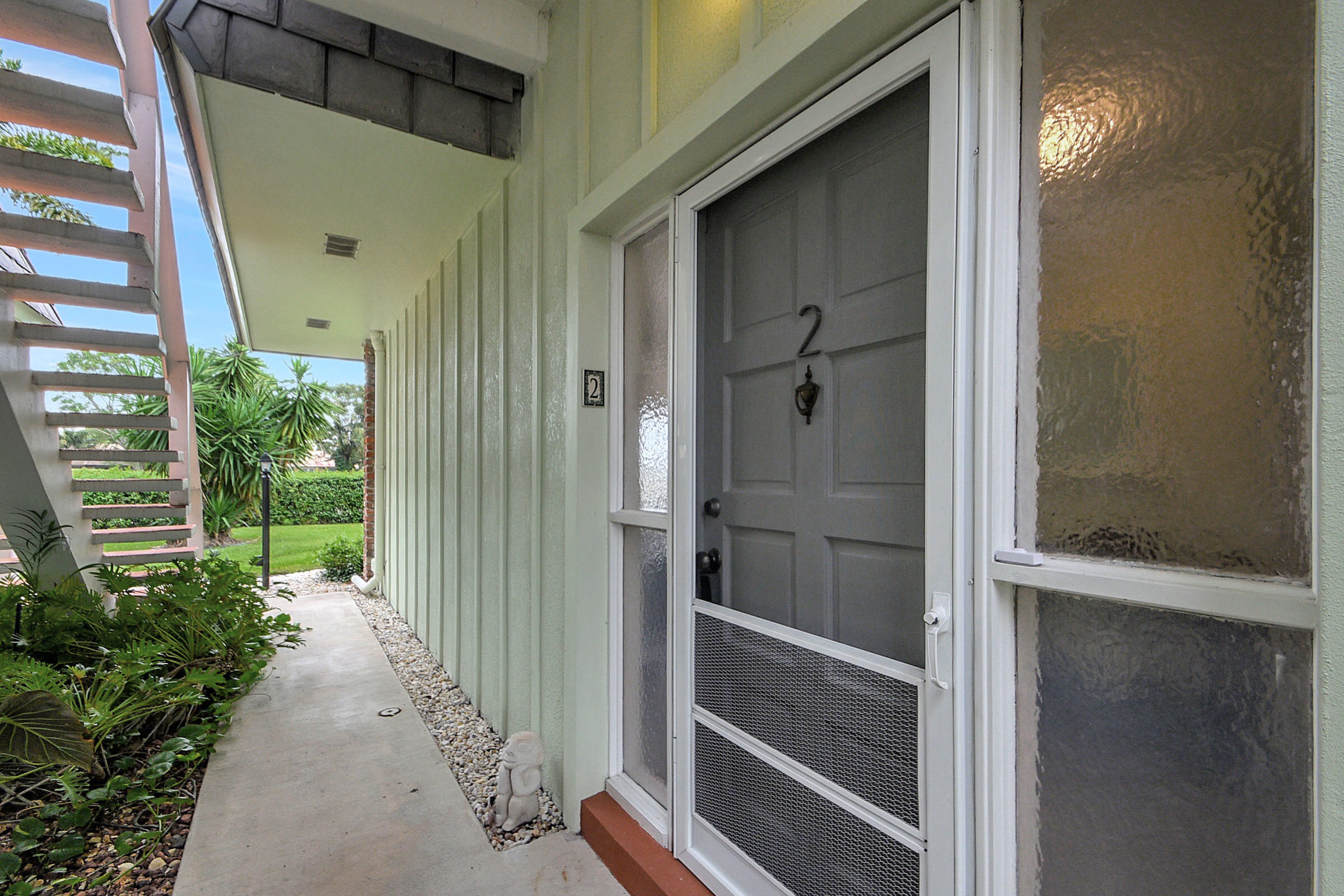 324 Orange Tree Drive, Unit 2 Atlantis, FL 33462 - Photo 2 of 67 Entrance