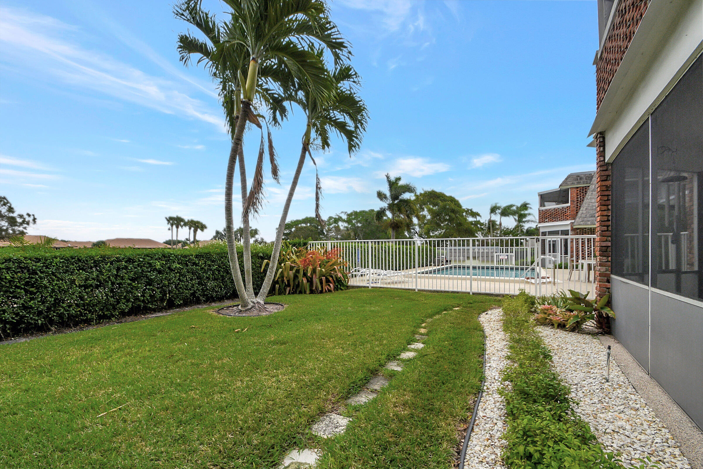 324 Orange Tree Drive, Unit 2 Atlantis, FL 33462 - Photo 28 of 67 walk to the pool
