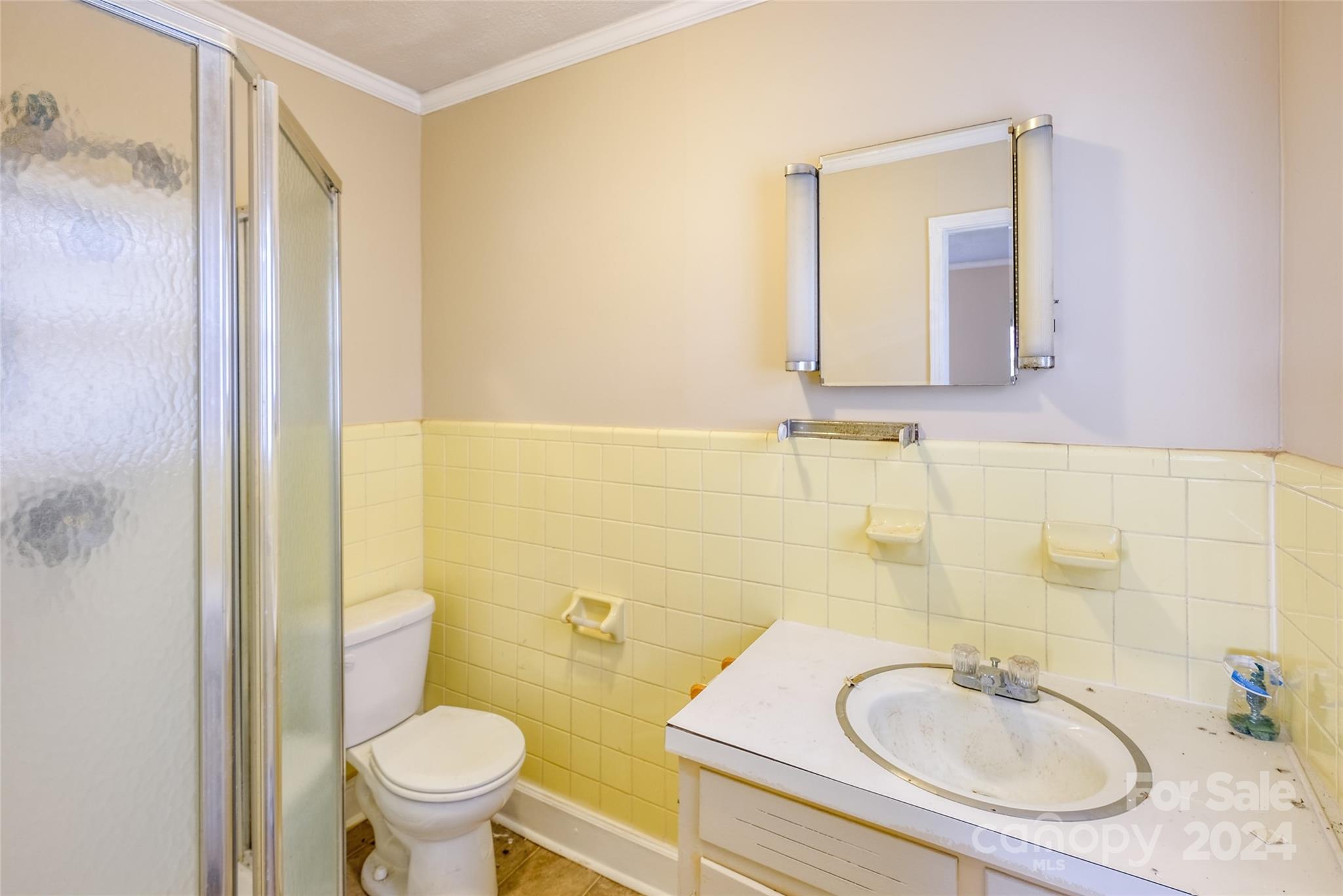 342 Stagecoach Road Northwest Concord, NC 28027 - Photo 12 of 25 a bathroom with a granite countertop sink and a mirror