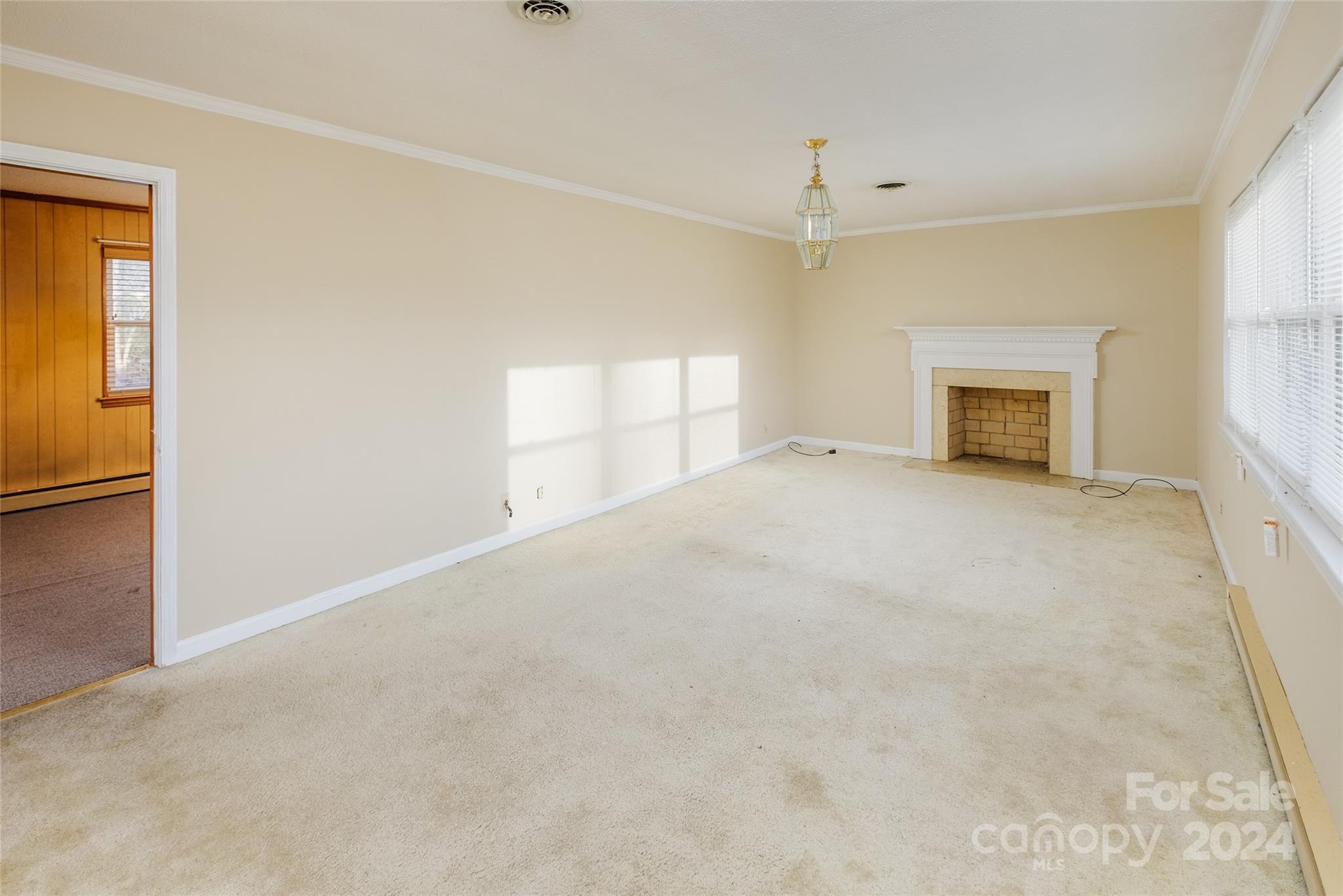 342 Stagecoach Road Northwest Concord, NC 28027 - Photo 2 of 25 a view of an empty room with a window