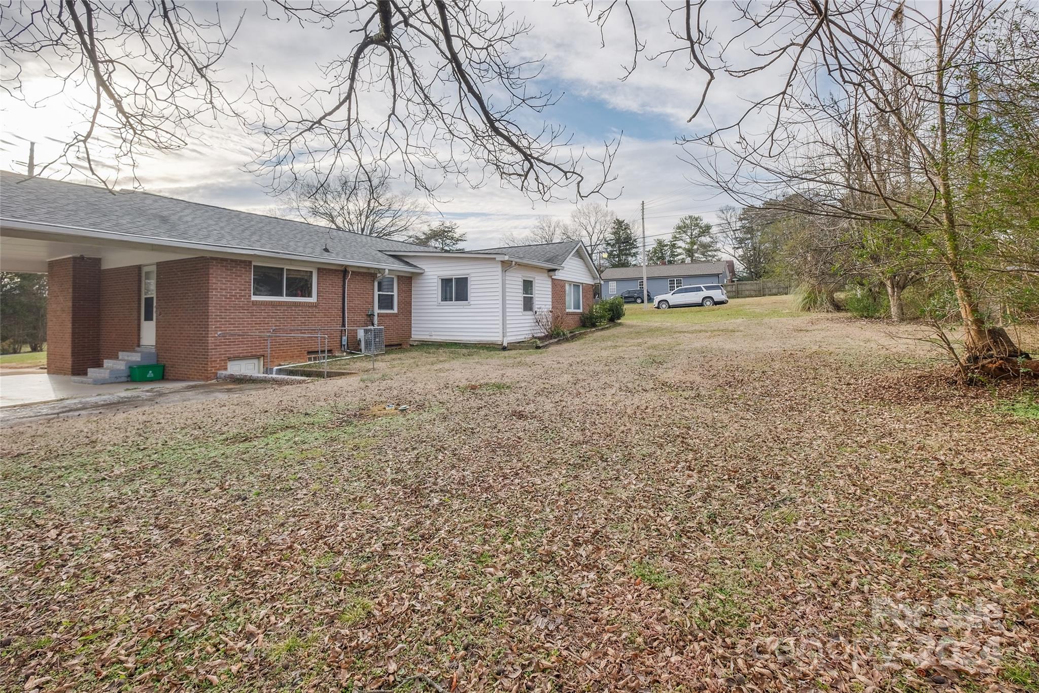 342 Stagecoach Road Northwest Concord, NC 28027 - Photo 24 of 25 a view of a house with a snow in the yard