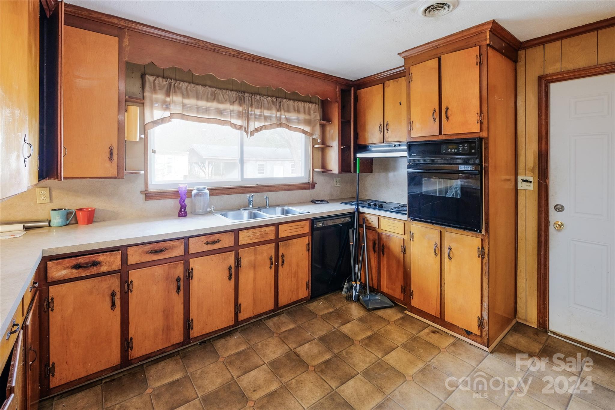 342 Stagecoach Road Northwest Concord, NC 28027 - Photo 7 of 25 a kitchen with stainless steel appliances granite countertop a refrigerator and a sink