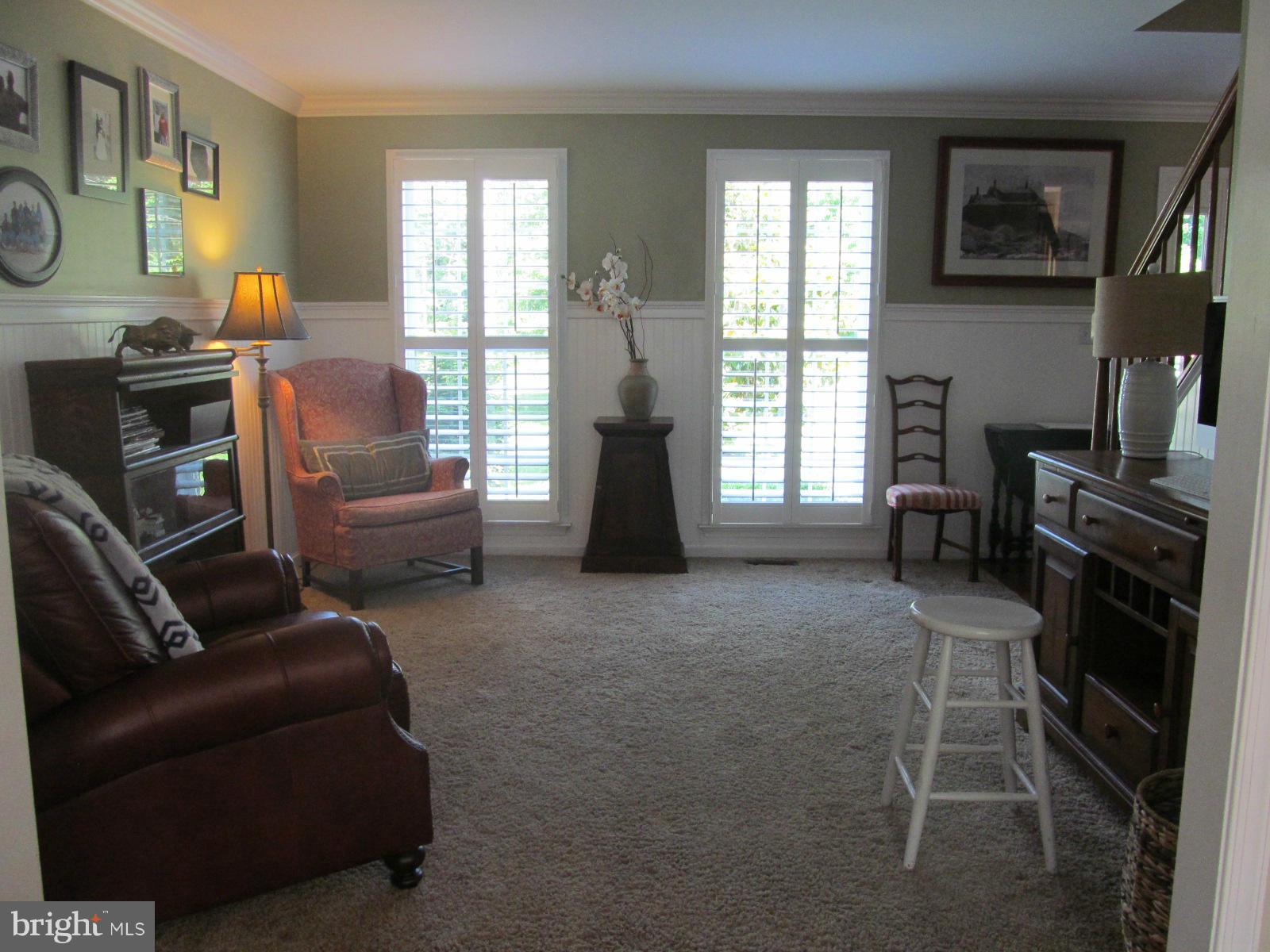 2523 Old Frederick Road Baltimore, MD 21228 - Photo 11 of 23 Formal Living Room accented w/ plantation shutters