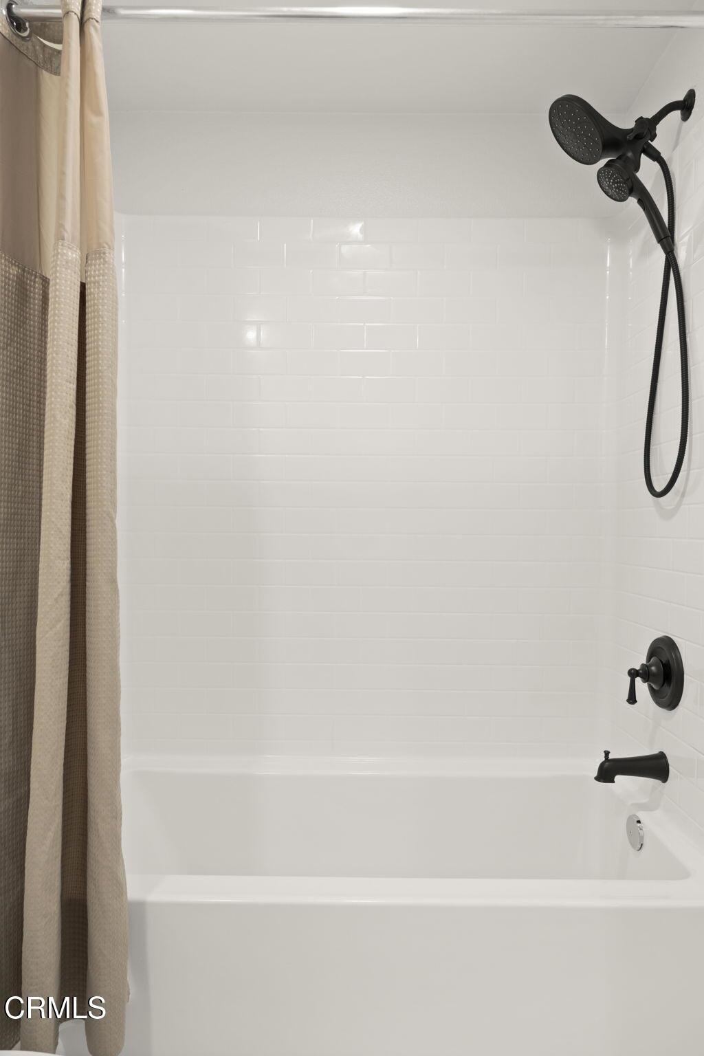 2850 Wagon Wheel Road, Unit 302 Oxnard, CA 93036 - Photo 16 of 50 a bathroom with a shower