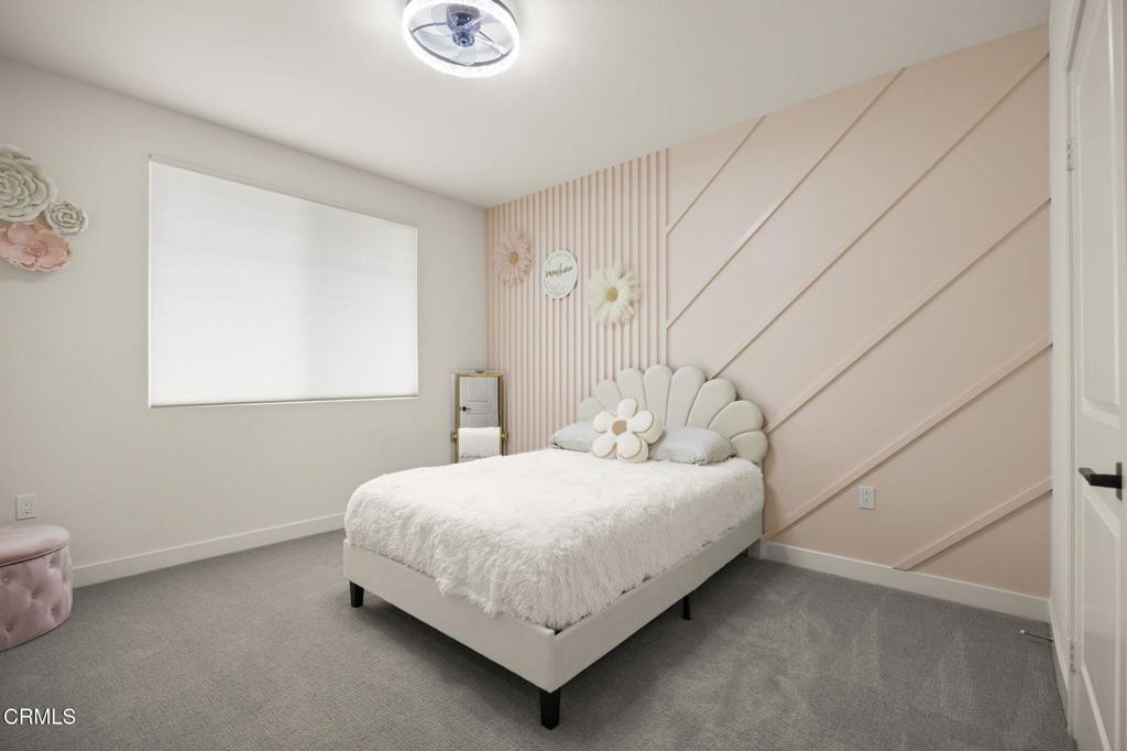 2850 Wagon Wheel Road, Unit 302 Oxnard, CA 93036 - Photo 17 of 50 a bedroom with a bed and a window