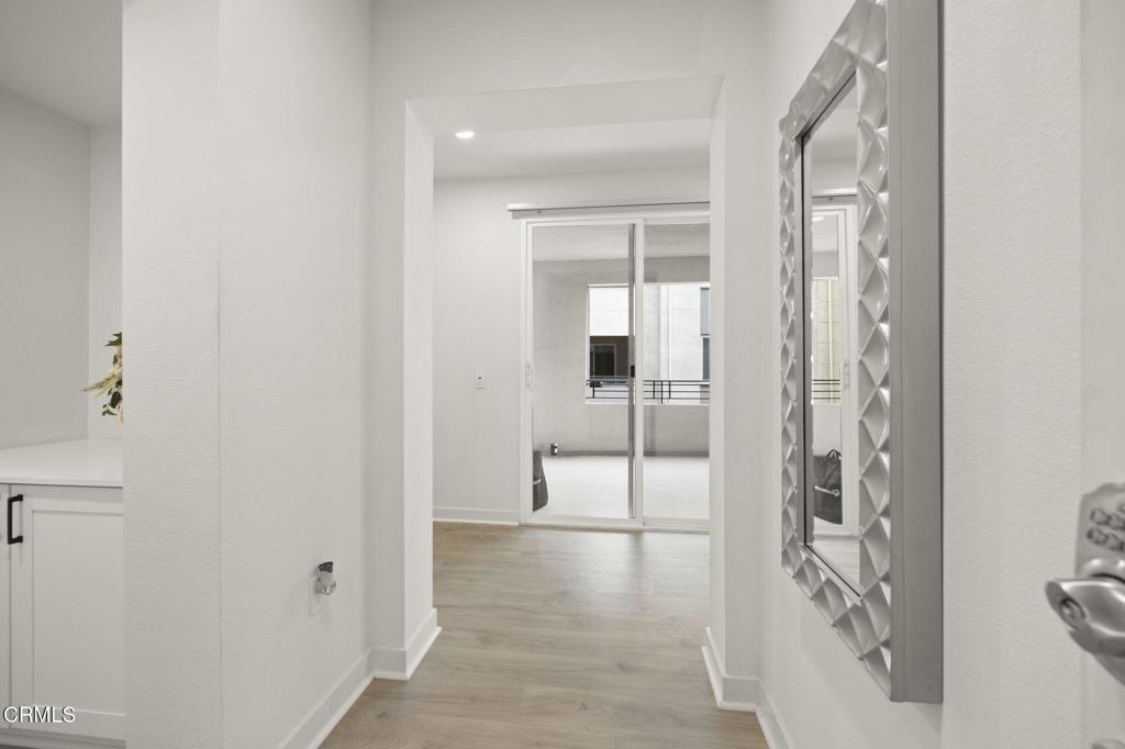 2850 Wagon Wheel Road, Unit 302 Oxnard, CA 93036 - Photo 20 of 50 a bathroom with a shower and a glass door