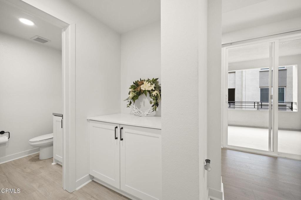 2850 Wagon Wheel Road, Unit 302 Oxnard, CA 93036 - Photo 22 of 50 a view of a bathroom with a sink and a toilet