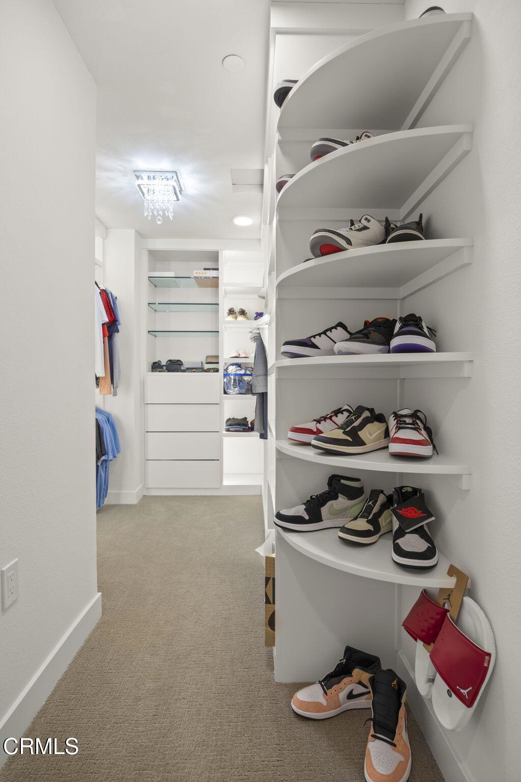 2850 Wagon Wheel Road, Unit 302 Oxnard, CA 93036 - Photo 31 of 50 a kitchen with a stove and cabinets