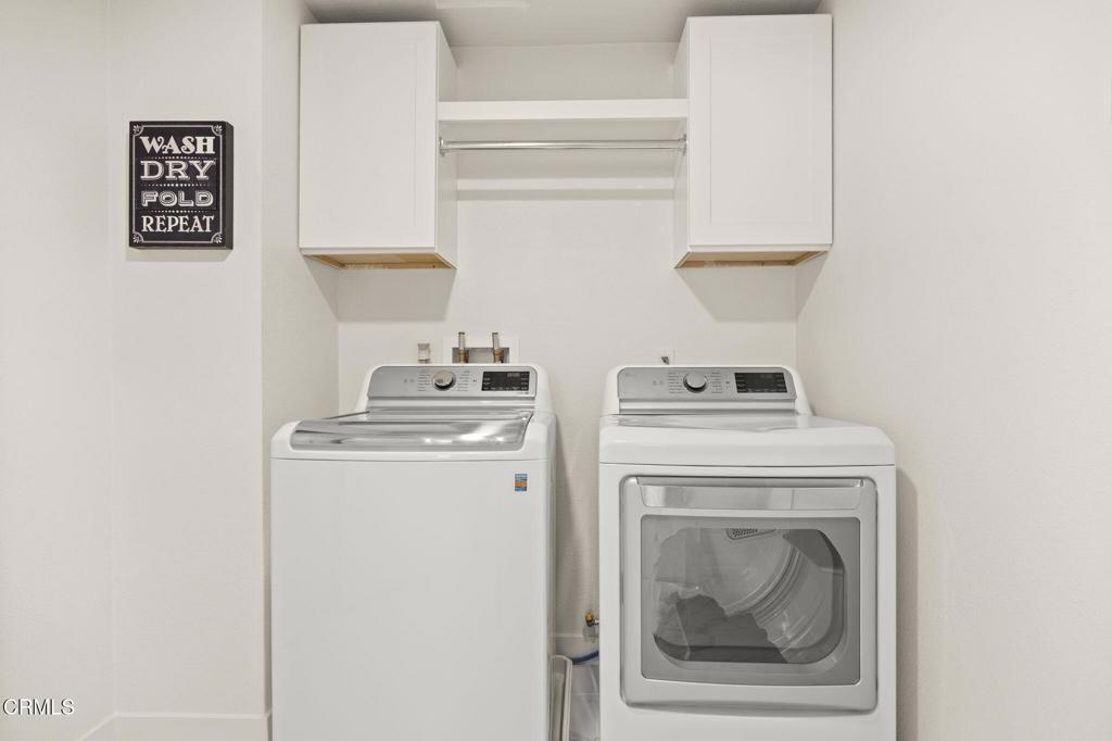 2850 Wagon Wheel Road, Unit 302 Oxnard, CA 93036 - Photo 34 of 50 a utility room with dryer and washer