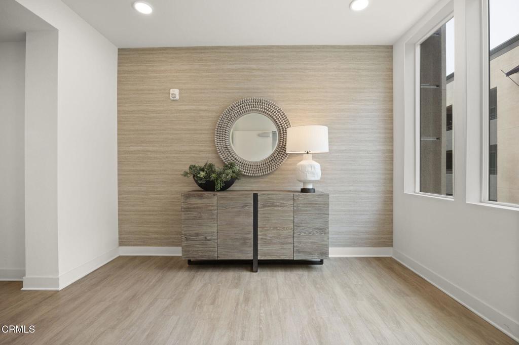 2850 Wagon Wheel Road, Unit 302 Oxnard, CA 93036 - Photo 39 of 50 a view of entryway with wooden floor