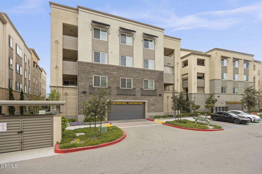 2850 Wagon Wheel Road, Unit 302 Oxnard, CA 93036 - Photo 4 of 50 a front view of a building with street view