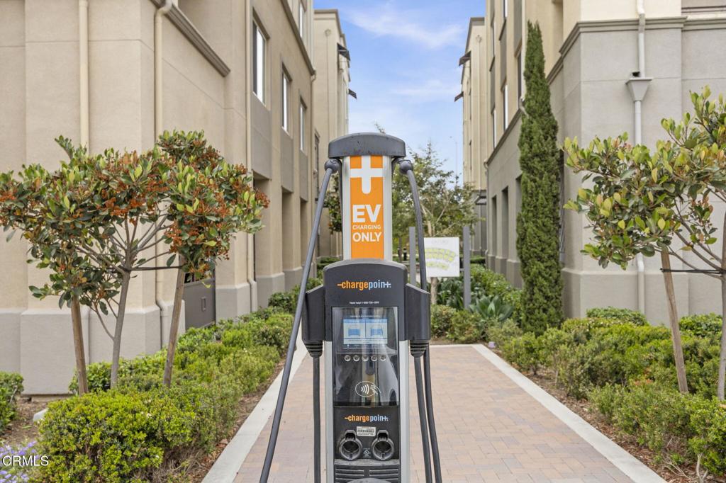 2850 Wagon Wheel Road, Unit 302 Oxnard, CA 93036 - Photo 42 of 50 a front view of a house with a yard