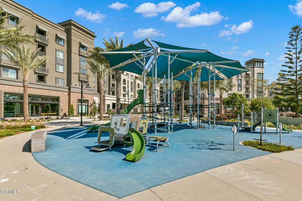2850 Wagon Wheel Road, Unit 302 Oxnard, CA 93036 - Photo 48 of 50 a view of outdoor space yard deck patio and outdoor kitchen