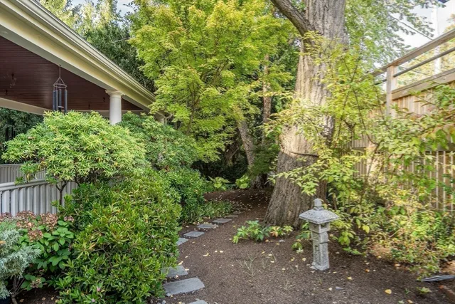 a house with a tree in the background