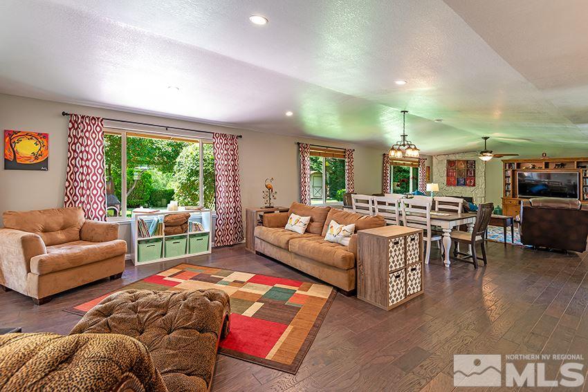14405 Rancheros Drive Reno, NV 89521 - Photo 8 of 20 a living room with furniture and a large window
