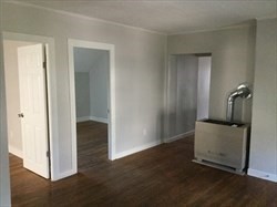 946 Rodman Street Fall River, MA 02721 - Photo 15 of 18 an entryway with a door and a mirror