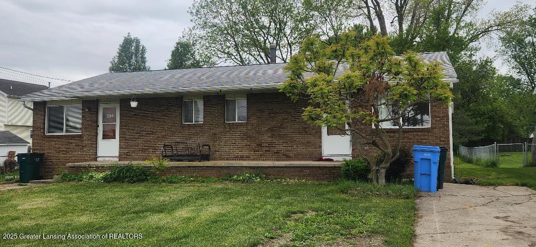 6622 North Aurelius Road Lansing, MI 48911 - Photo 2 of 32 front view of duplex