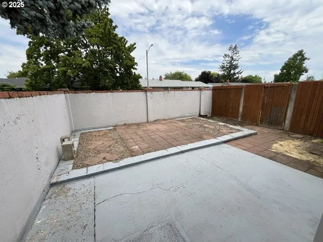a house with a tree in front of it