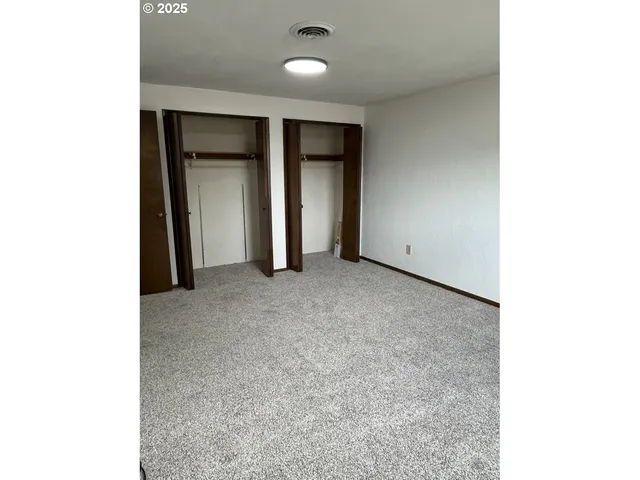 a view of a room with rack on the wall