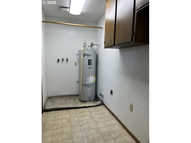 a view of a bathroom from a hallway