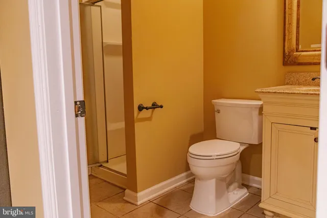 a bathroom with a toilet and a sink