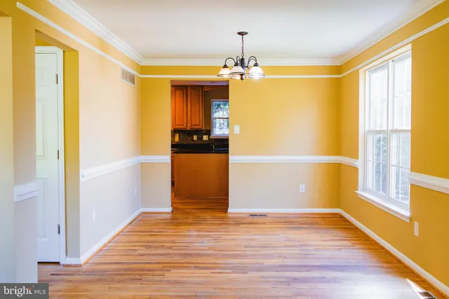 a view of a livingroom with wooden floor