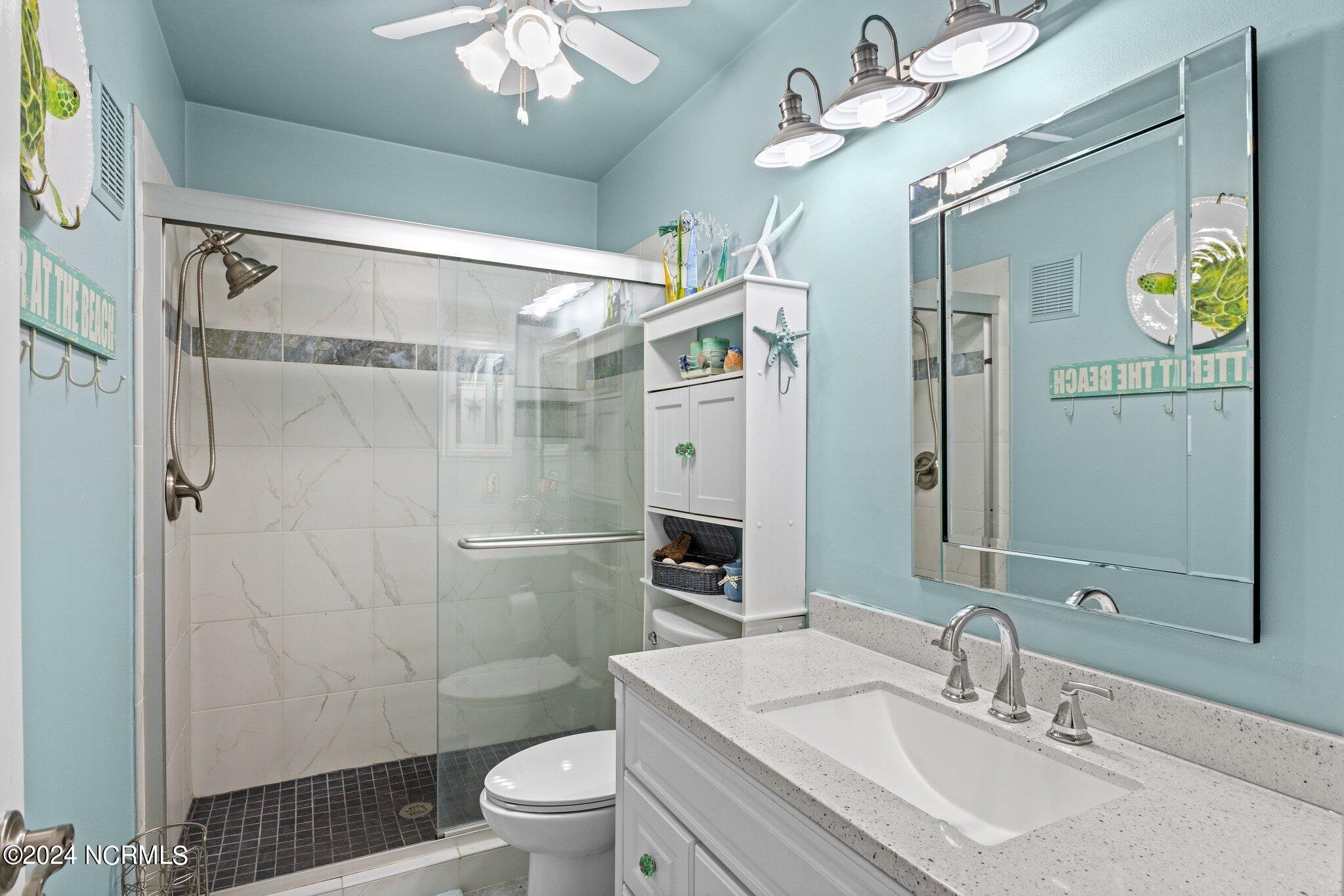 497 Salter Path Road, Unit B22 Pine Knoll Shores, NC 28512 - Photo 19 of 36 primary bathroom