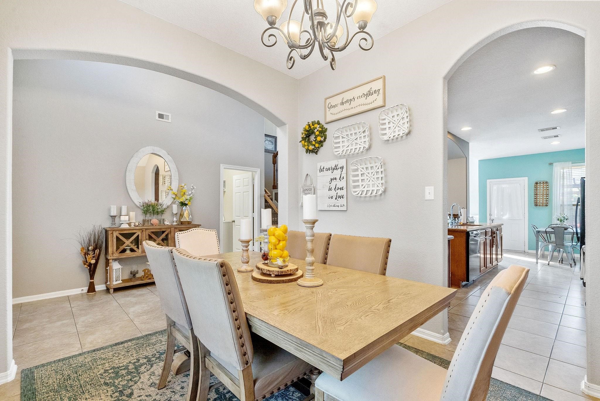 62 West Lasting Spring Circle The Woodlands, TX 77389 - Photo 13 of 46 a view of a dining room with furniture