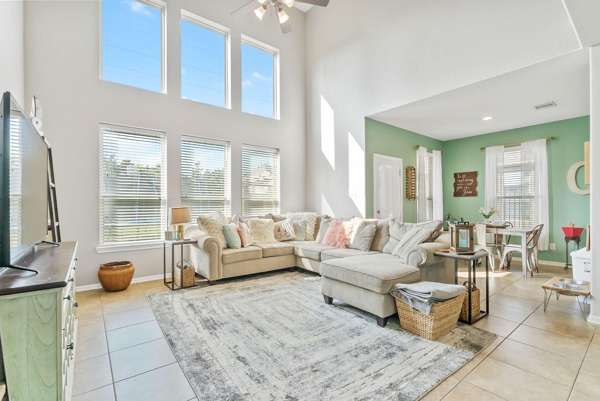 62 West Lasting Spring Circle The Woodlands, TX 77389 - Photo 24 of 46 a living room with furniture or couch and a flat screen tv