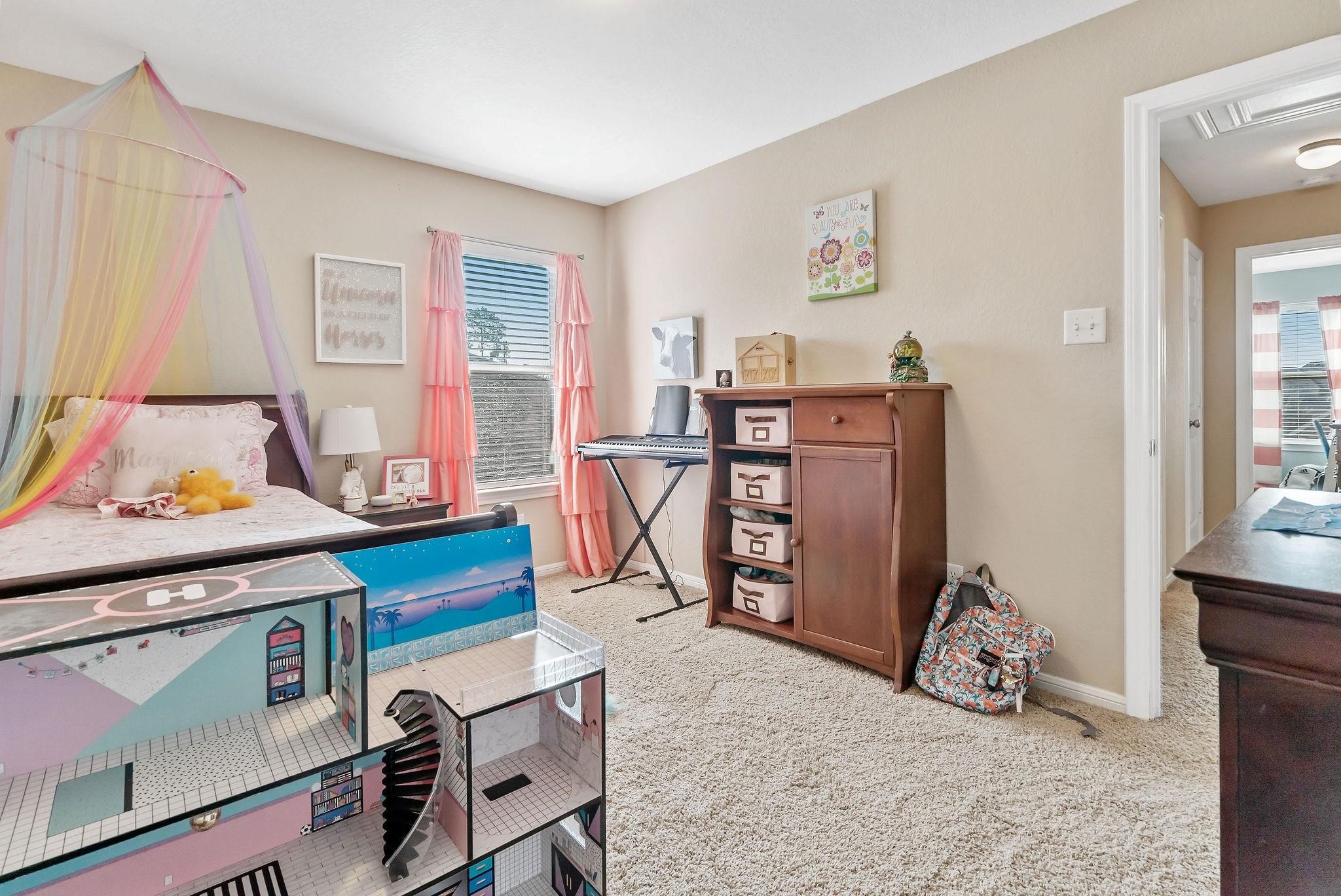 62 West Lasting Spring Circle The Woodlands, TX 77389 - Photo 35 of 46 a view of a livingroom with furniture and a window
