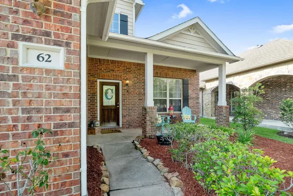 a house view with a garden space