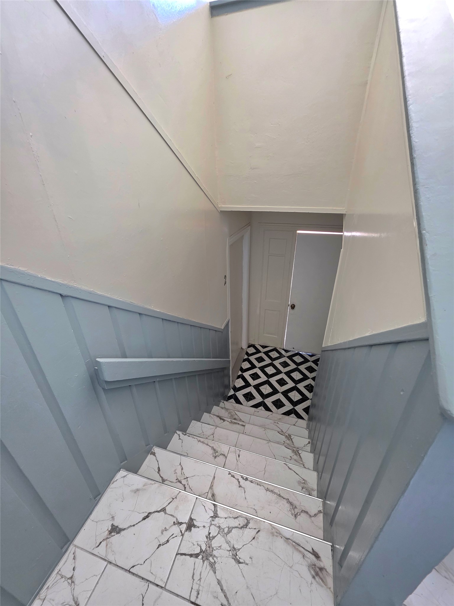 805 Sissom Road Killeen, TX 76541 - Photo 7 of 35 Staircase featuring a wainscoted wall